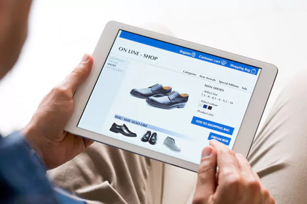 Man shopping online - guided online shopping.

